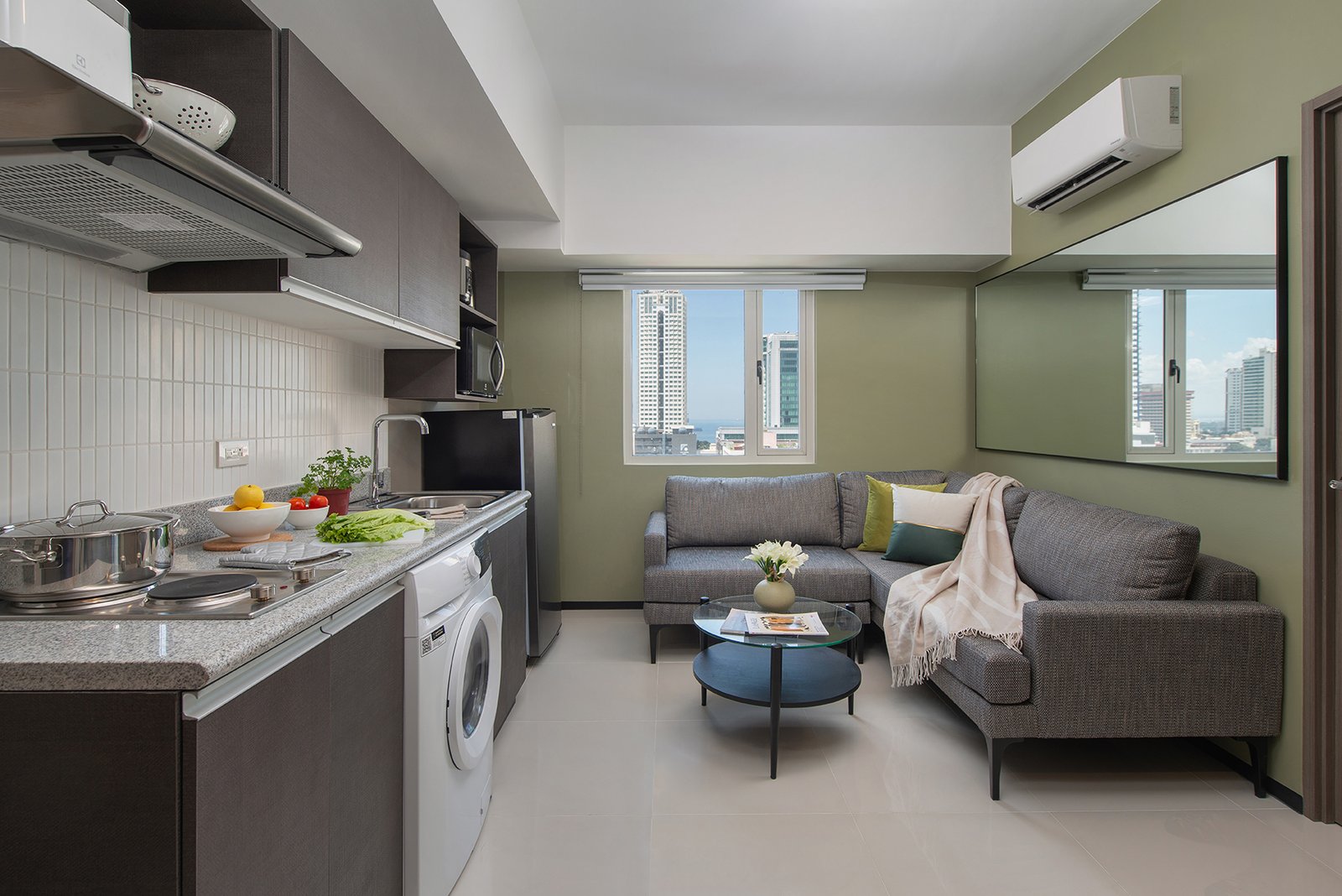 SR_Philippines_Manila_The-Suites-at-TLM_2BR-Dlx_Living-Room-_-Kitchen-HR